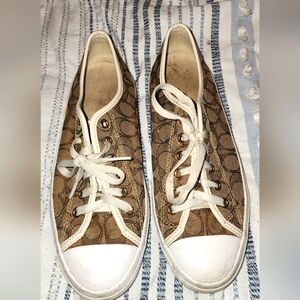 Tan and white Coach sneakers